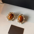 Light Luxury Oval Faux Pearl Tiger Eye Stone Stud Earrings For Women view 4