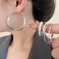 Minimalist Iron Jewelry Set With Smooth Geometric Hoop Earrings And Pearl Accents view 2