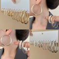 Minimalist Iron Jewelry Set With Smooth Geometric Hoop Earrings And Pearl Accents view 1