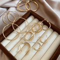 Minimalist Iron Jewelry Set With Smooth Geometric Hoop Earrings And Pearl Accents view 3