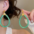 European Style Faux Leather Oval Hollow Geometric Pendant Drop Earrings For Women view 3