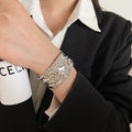 Iron Textured Flower Open Bangle, Minimalist European American Light Luxury Round Bracelet view 3