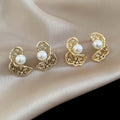 Copper Zircon Twisted Hollow Pearl Stud Earrings Irregular Geometric Luxury Style view 3