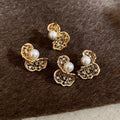 Copper Zircon Twisted Hollow Pearl Stud Earrings Irregular Geometric Luxury Style view 1
