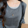 Light Luxury Faux Pearl Sweater Necklace With Zircon Tiger Eye Wood Horse Pendant view 3