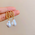 Gold Plated Silver Post Hollow Oval Faux Pearl Stud Earrings French Vintage Light Luxury view 4