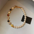 Light Luxury 18K Gold Plated Zircon Heart Imitation Pearl Geometric Bangle For Women view 1