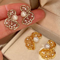 Irregular Geometric Faux Pearl Zircon Twisted Hollow Stud Earrings Light Luxury Silver Needle Jewelry view 1