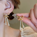 Elegant Light Luxury Bow Zircon Faux Pearl Stud Earrings with Gold Plated Silver Pins view 1