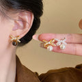 Gold Plated Silver Needle Faux Pearl Tiger Eye Bow Stud Earrings Vintage Light Luxury Style view 2
