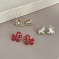 Elegant New Year Red Enamel Pony And Gold Alloy Zircon Rocking Horse Asymmetric Stud Drop Earrings view 3