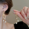 Light Luxury Geometric Fork Line Faux Pearl Stud Earrings With Silver Pins view 1
