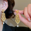 Light Luxury Geometric Hollow Faux Pearl Stud Earrings, Retro Chinese Style Round Ear Jewelry view 1
