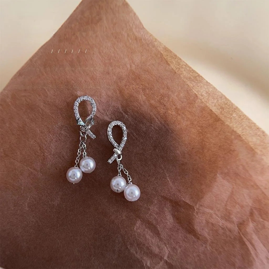 Light Luxury Copper High Luster Pearl Micro Pave Zircon Knot Tassel Drop Earrings
