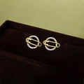 Eco-Friendly Copper Micro Pave Zircon Planet Stud Earrings Geometric Hollow Pin Design