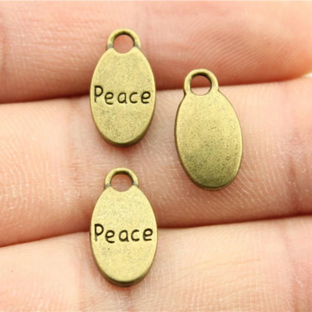 15x8mm 1.4g Antique Bronze Zinc Alloy Peace Charm Pendant for DIY Necklace Bracelet Jewelry Making