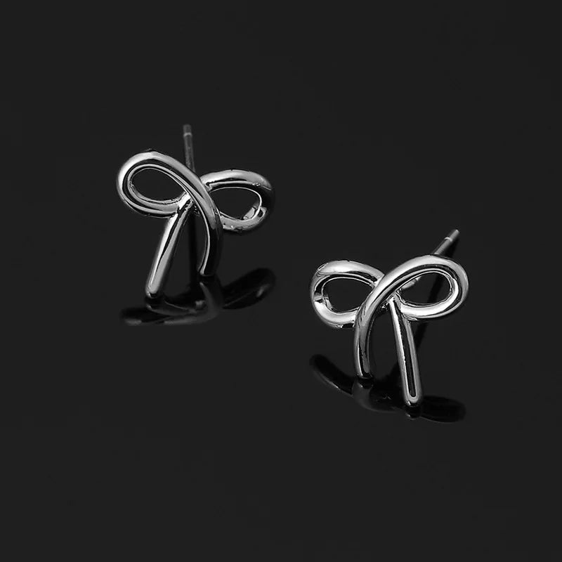 Elegant Silver Alloy Bow Knot Stud & Clip On No Piercing Minimalist Metal Ribbon Women's Earrings
