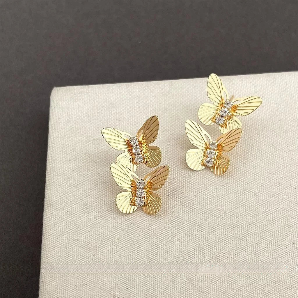 Elegant Copper Butterfly Drop Earrings With Micro Pave Zircon