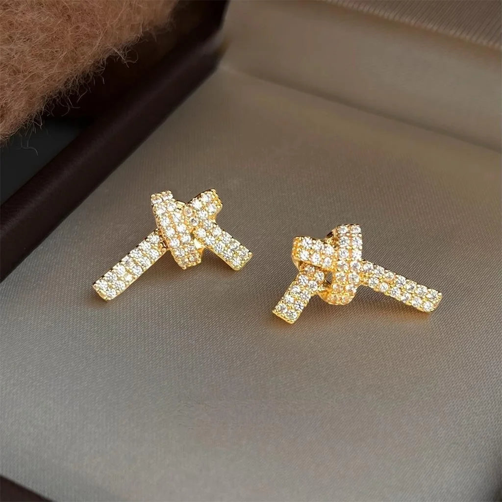 High-End Copper Micro Pave Zircon Bow Knot Stud Earrings For Women Electroplated Line Design