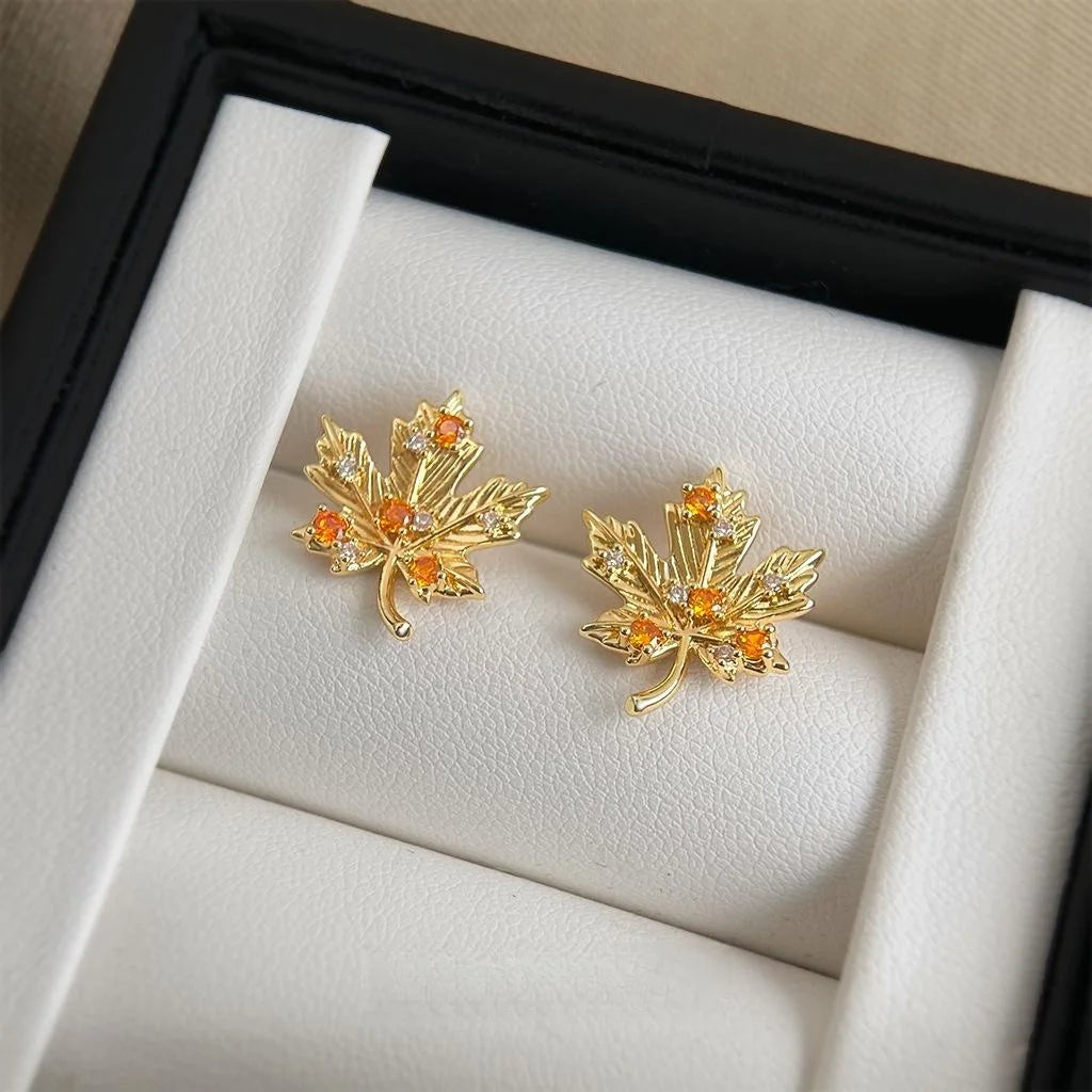 Designer Maple Leaf Micro Pave Zircon Copper Stud Earrings, Elegant Fall Style