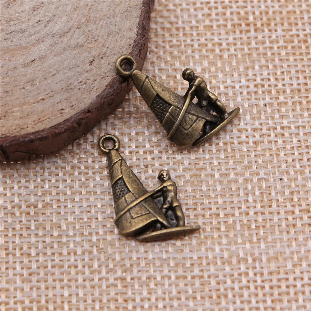 22x14mm 1.2g Antique Bronze Tone Zinc Alloy Sailing Athlete Sailboat Charm Pendant for Sports Jewelry DIY
