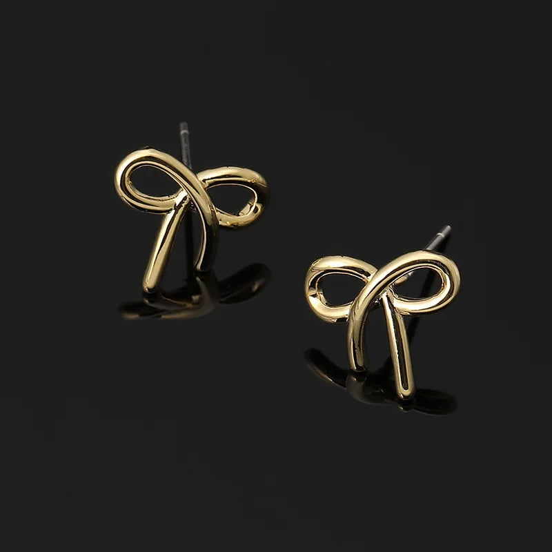 Elegant Minimalist Gold Alloy Ribbon Bow Knot Spiral Stud & Clip On No Piercing Fashion Earrings