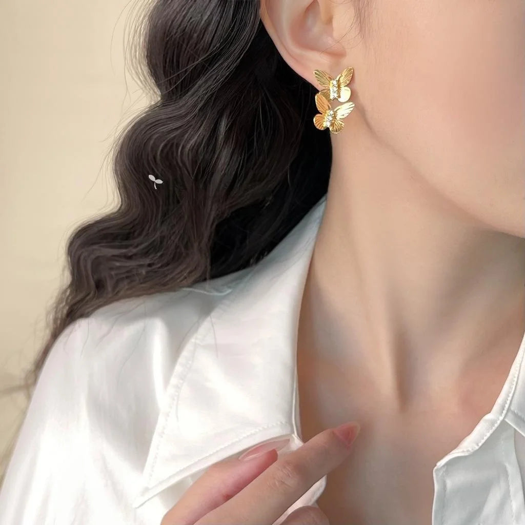 Elegant Copper Butterfly Drop Earrings With Micro Pave Zircon