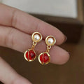 Vintage Burgundy Glass Crystal Drop Earrings With Copper Geometric Teardrop Design
