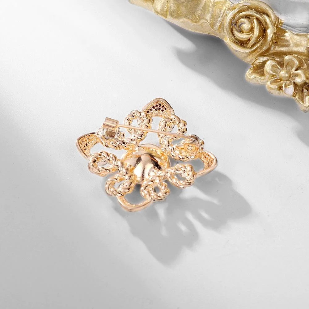 Elegant Gold Alloy Brooch With Deep Blue Glass Crystal And Rhinestone Knot Design Lapel Pin Gift
