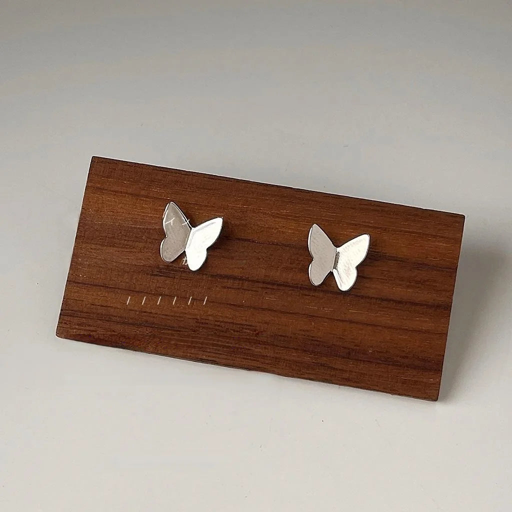 Minimalist Silver Tone Copper Butterfly Stud Earrings Smooth Metal Commuter Jewelry