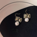 Handmade Antique Blackened Copper Bow Pearl Drop Earrings Elegant Commuter Jewelry