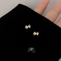 Mini 14K Gold Plated Copper Micro Pave Cubic Zirconia Bow Stud Earrings For Daily Wear