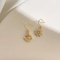 18K Gold Plated Copper Asymmetric Anchor And Ship Wheel Drop Earrings Light Luxury