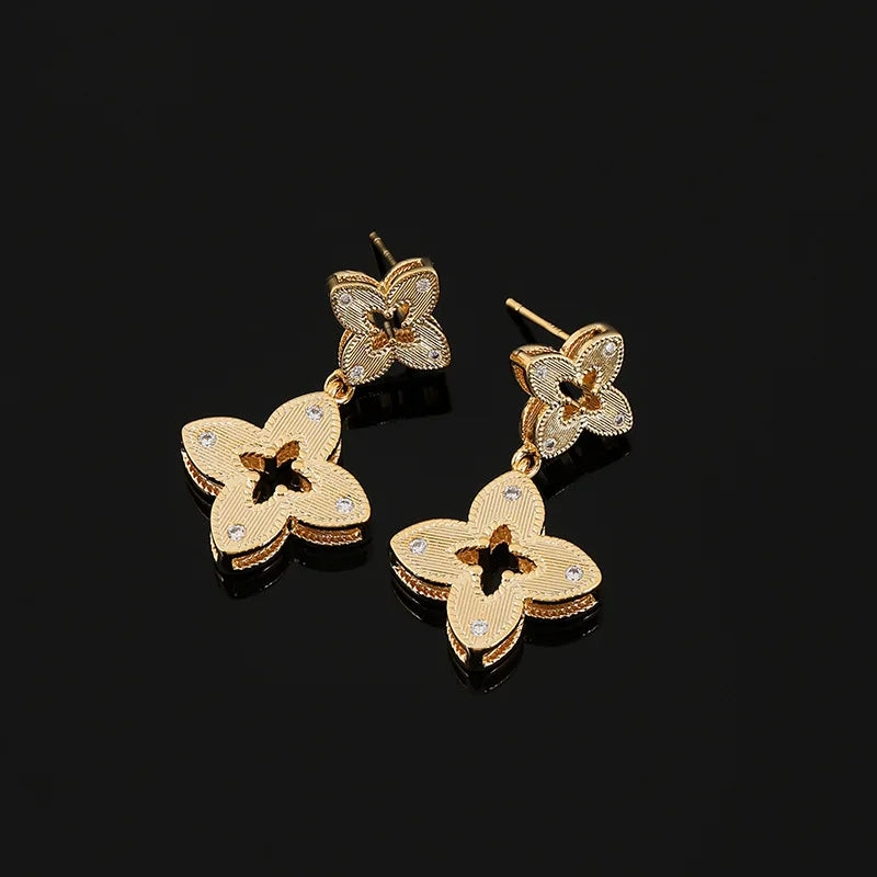 Elegant Gold Alloy Hollow Four Leaf Clover Rhinestone Dangle Stud & Clip On No Piercing Earrings