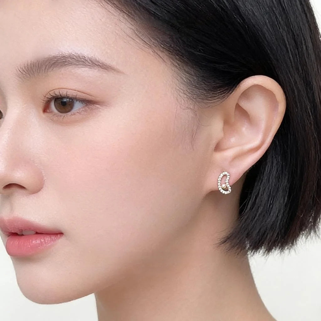 Simple Copper Micro Pave Zircon Pea Stud Earrings With Pearl Hollow Curved Geometric Design
