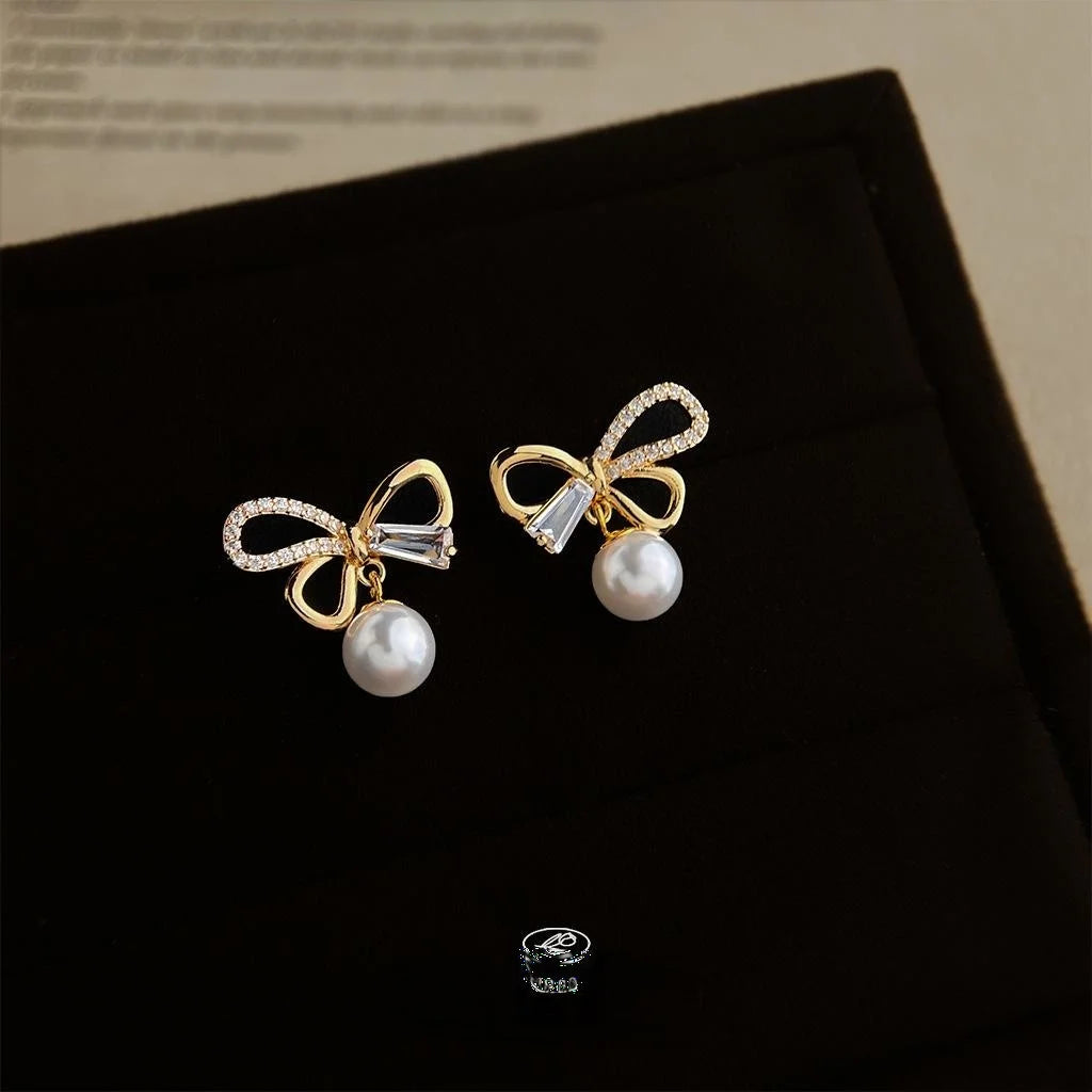 14K Plated Copper Bow Stud Earrings With Micro Pave Zircon And High Luster Pearl
