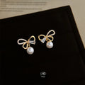 14K Plated Copper Bow Stud Earrings With Micro Pave Zircon And High Luster Pearl