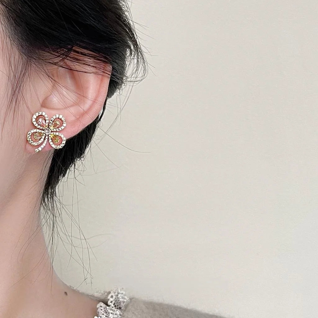 18K Gold Plated Copper Flower Stud Earrings With Micro Pave Color CZ Hollow Lucky Flower Design