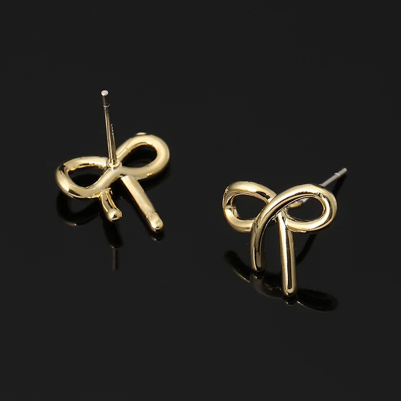 Elegant Minimalist Gold Alloy Ribbon Bow Knot Spiral Stud & Clip On No Piercing Fashion Earrings
