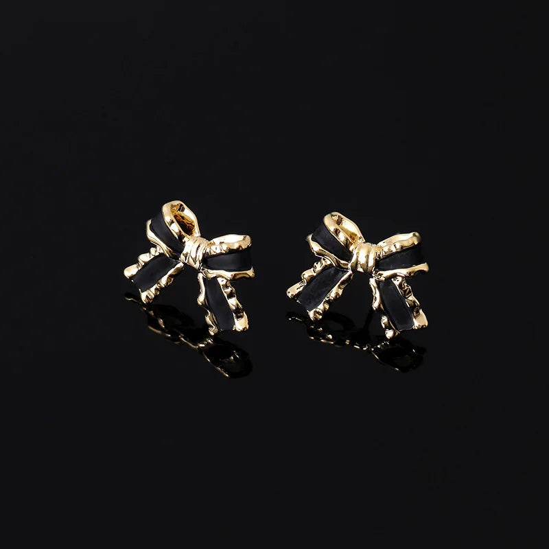 Elegant French Bowknot Black Enamel Alloy Spiral Stud & Clip On No Piercing Women's Fashion Earrings