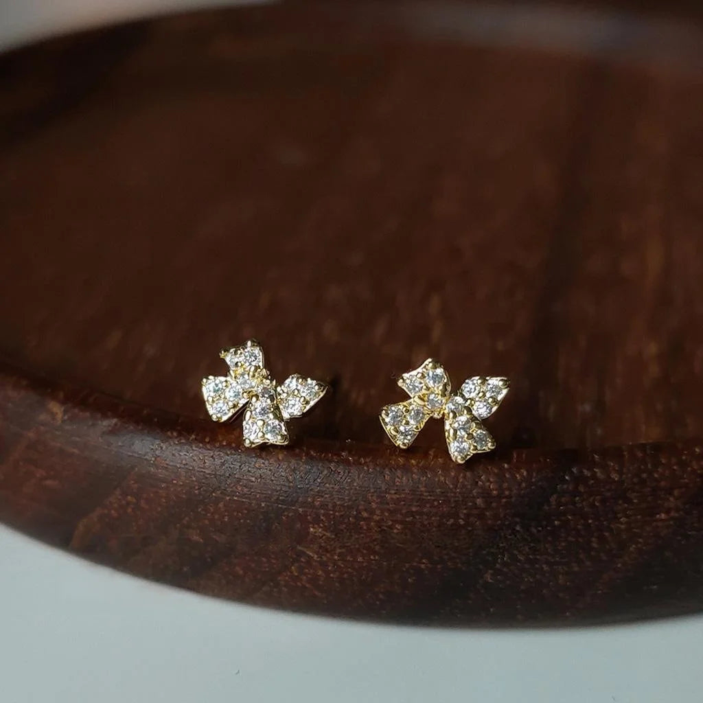Silver Plated Copper Micro Pave Zircon Mini Bow Knot Stud Earrings For Women