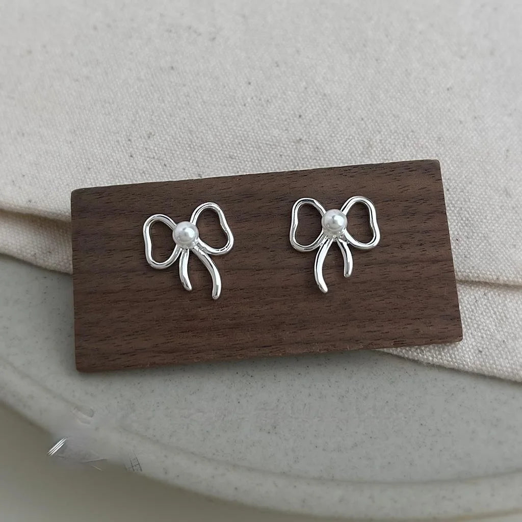 Sweet Cool Bow Knot Stud Earrings Copper Hollow Line Minimalist Women's Jewelry
