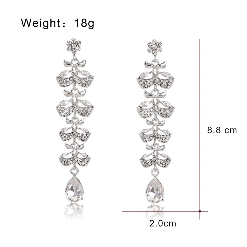 Luxury Rhinestone Leaf Tassel Earrings With Blue Teardrop Crystal, Elegant Long Dangle For Wedding Party
