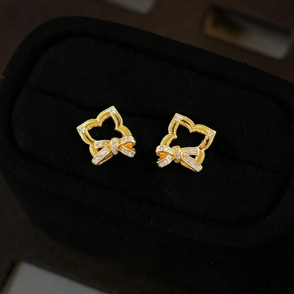 Light Luxury Micro Pave Zircon Hollow Geometric Bow Copper Stud Earrings With Silver Plated Pins