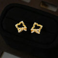 Light Luxury Micro Pave Zircon Hollow Geometric Bow Copper Stud Earrings With Silver Plated Pins