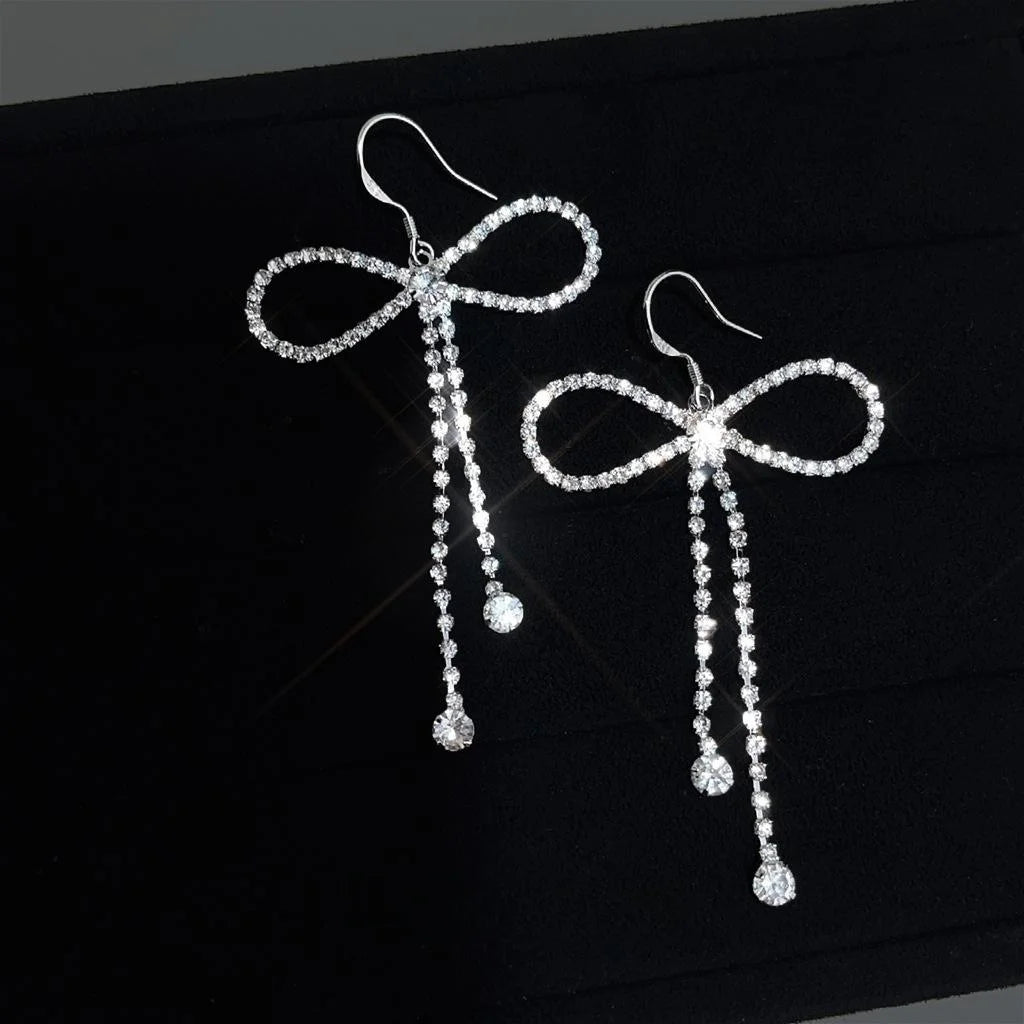 Korean Sweet Cool Copper Bow Drop Earrings With Silver Plated Pins And Rhinestone Accents