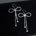 Korean Sweet Cool Copper Bow Drop Earrings With Silver Plated Pins And Rhinestone Accents
