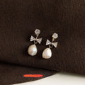 Vintage Baroque Freshwater Pearl Bow Drop Earrings With Zircon And Silver Plated Pins