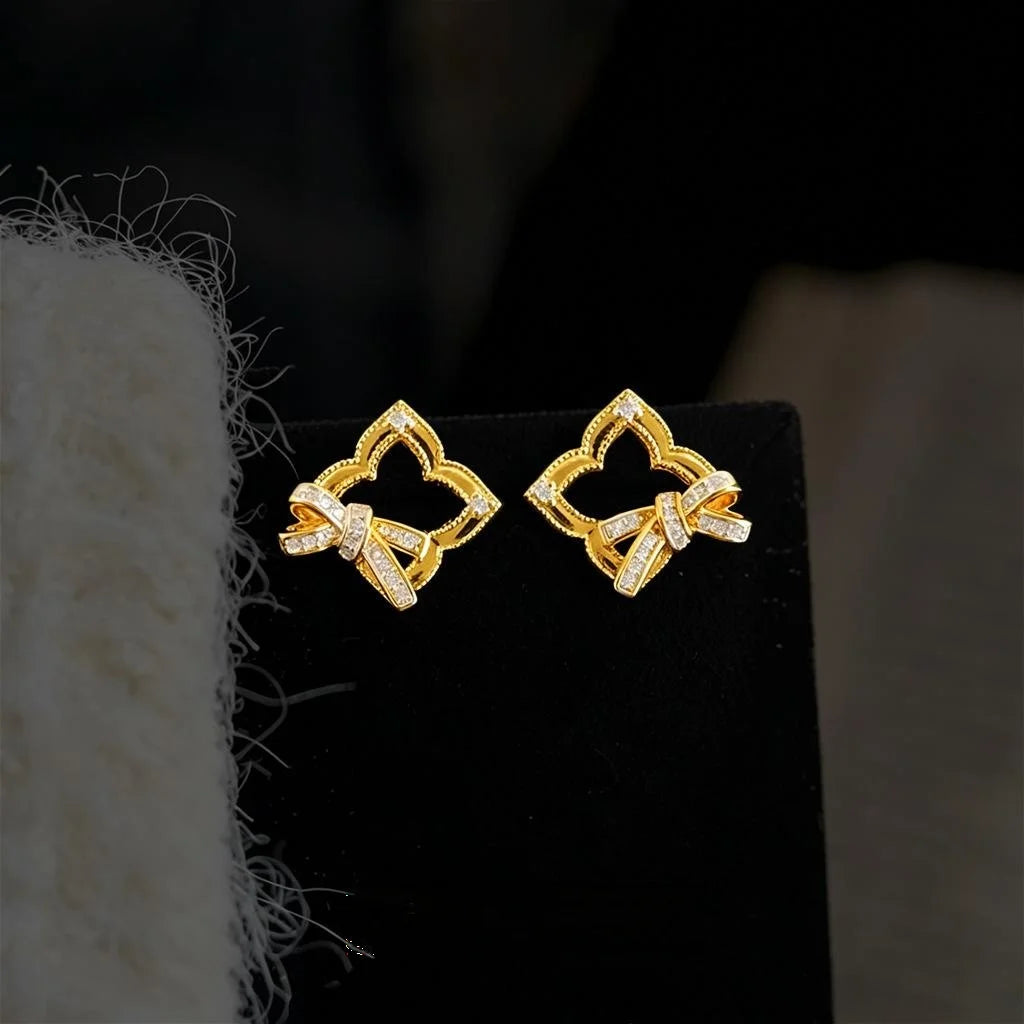 Light Luxury Micro Pave Zircon Hollow Geometric Bow Copper Stud Earrings With Silver Plated Pins
