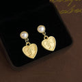 Vintage Matte Alloy Heart Coin Portrait Stud Earrings With Silver Plated Pins